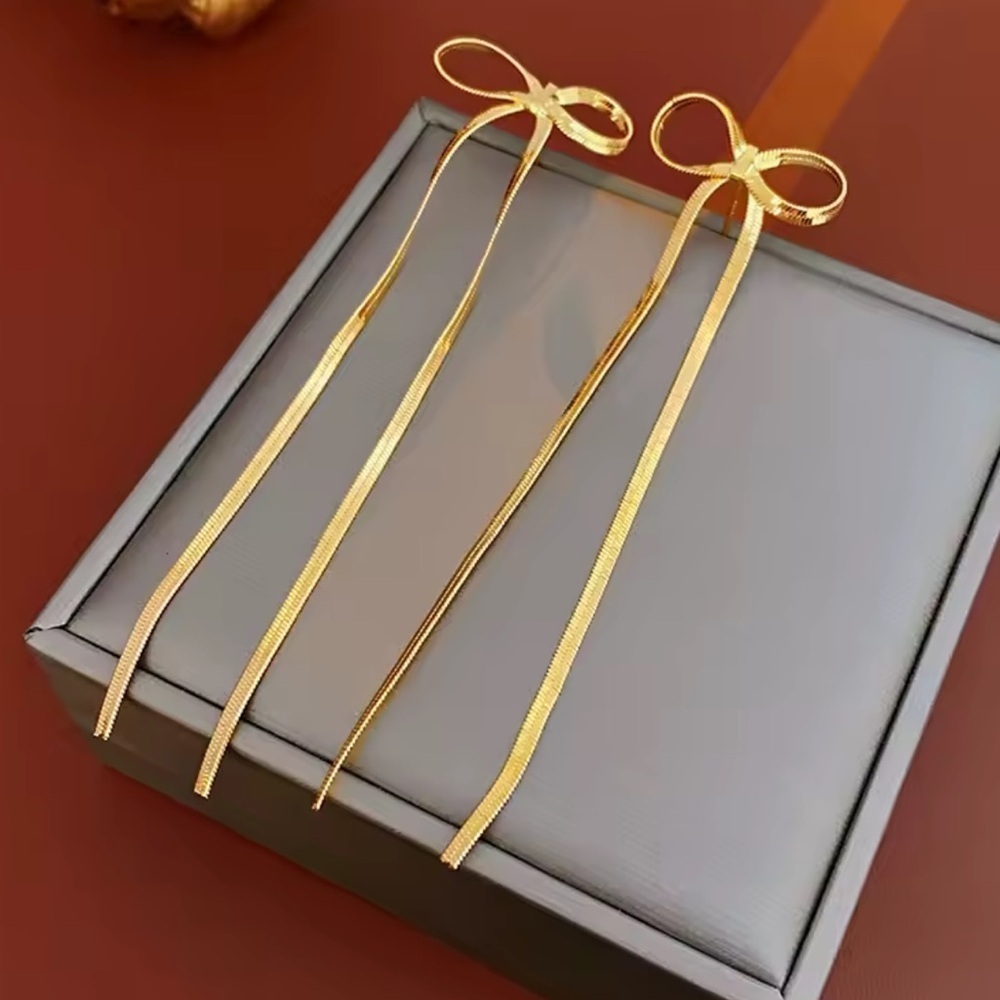 Chic Gold Bow Earrings – Minimalist Ribbon Style - Picture 5 of 7